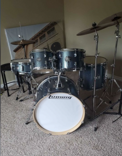 This looks like a decent buy; all the hardware and accoutrements are in place and included with the drums. Ludwig is a nationally-recognized brand. 